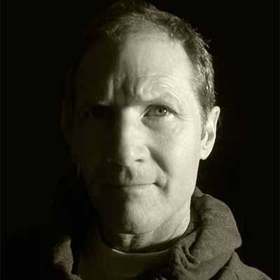 Head shot of Eric, lighted from the side